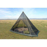 DD SuperLight Tipi Mesh Inner tent set up on grassy field, perfect for lightweight adventures with DD Hammocks.